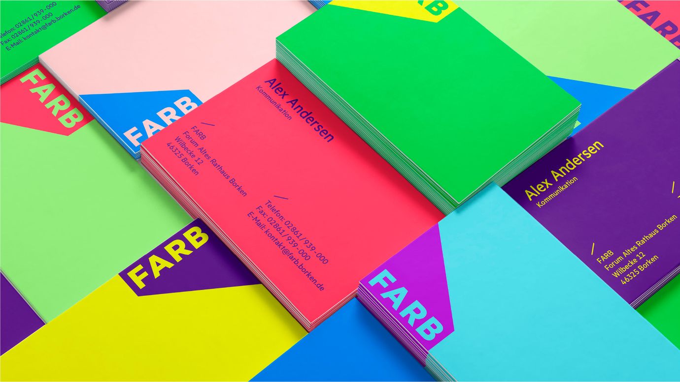 A vibrant pattern of colorful business cards, most of them with the FARB logotype in a contrasting color in one corner. Some cards reveal their backsides, displaying contact information in a clean, sans-serif font.